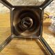 Glass and brass suspension