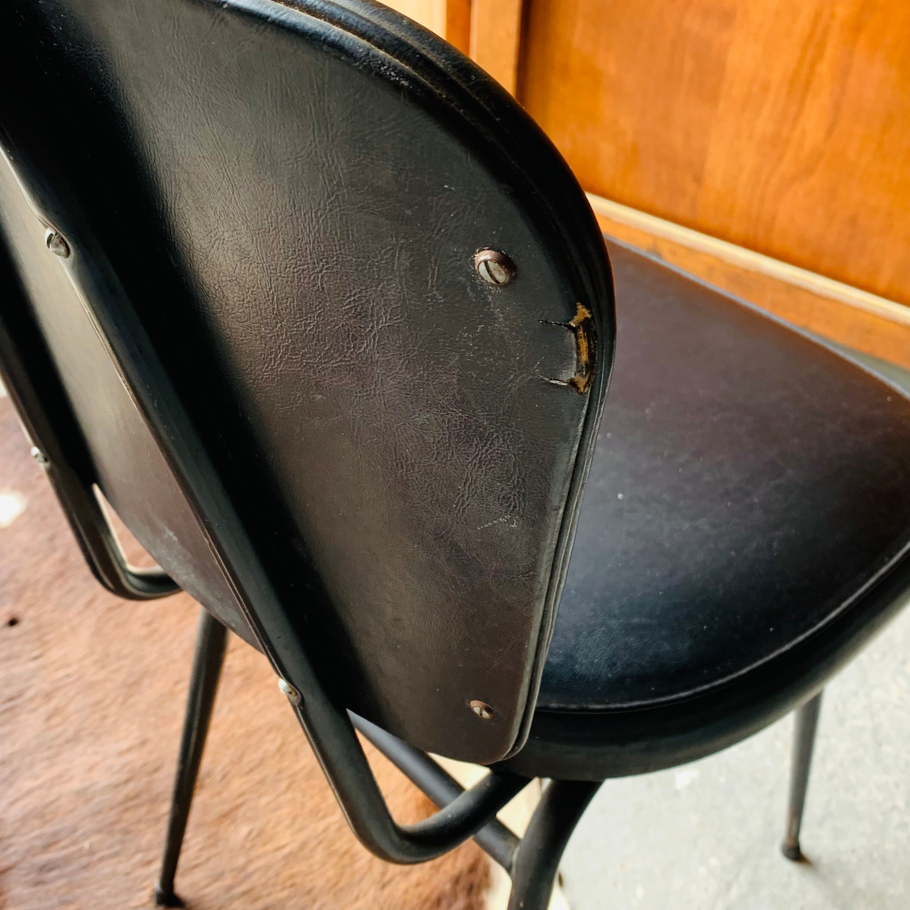 Pair of vintage black skai chairs