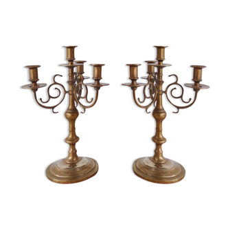 Pair of four-light candle holders in gilded brass