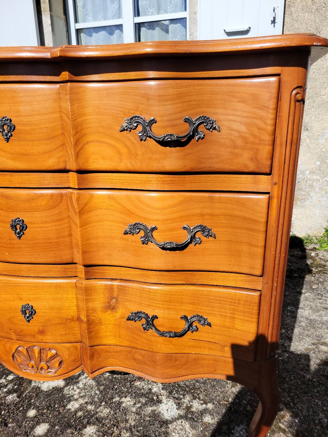 Louis XV style crossbow commode in cherry wood