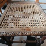 Chair with a decoration of foliage and bunches of grapes