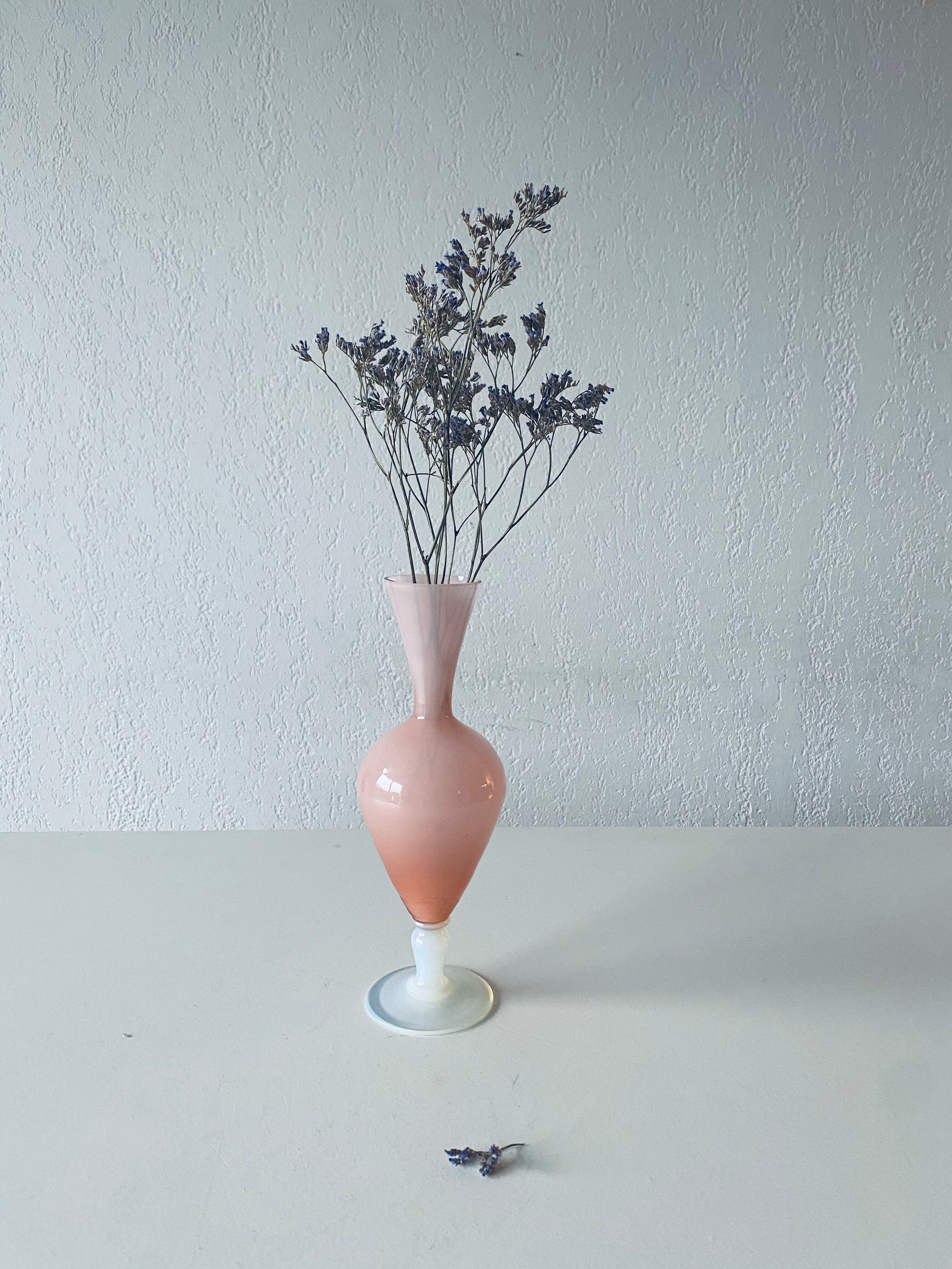 Old vase in pink opaline