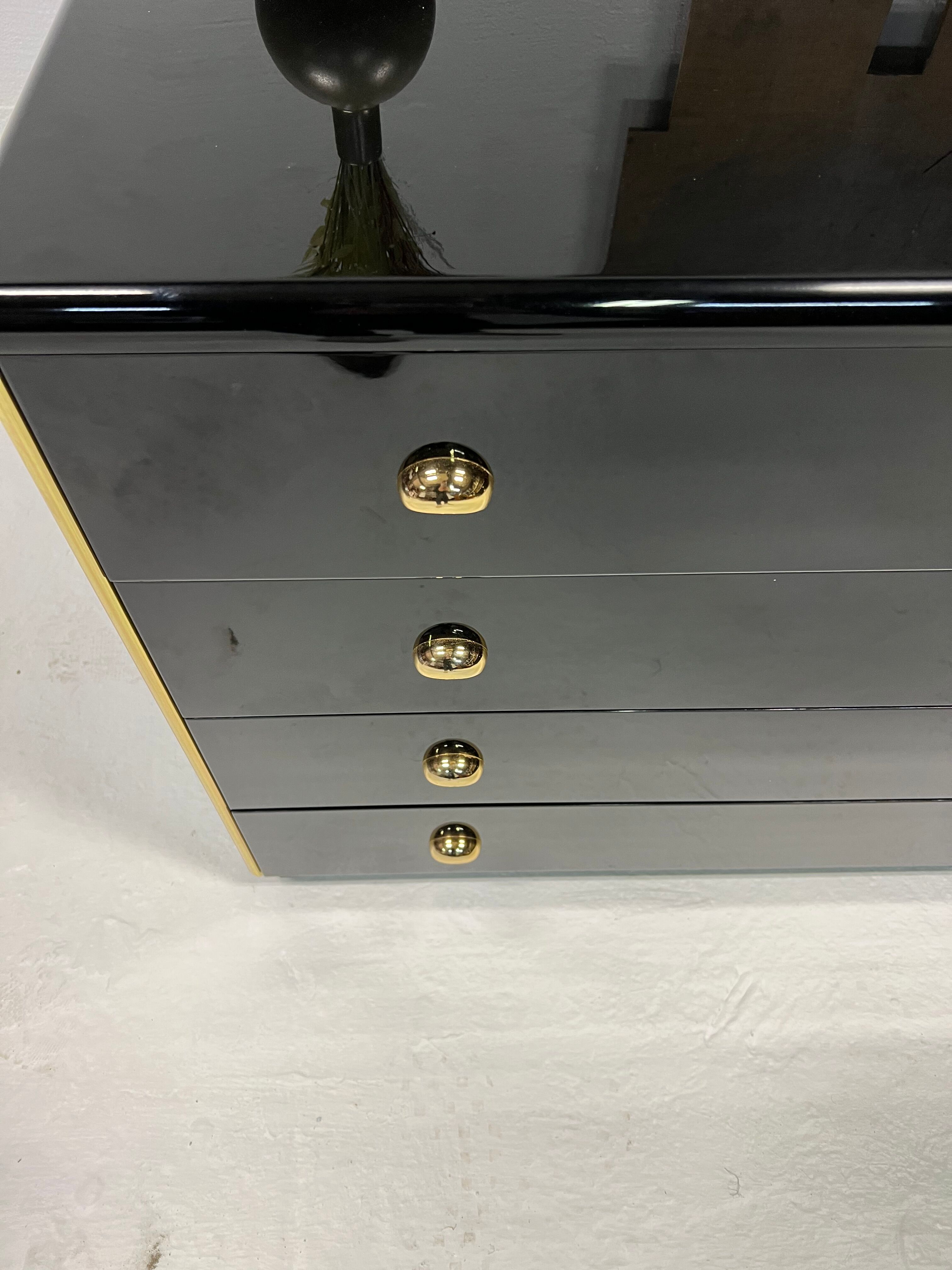 Black lacquered chest of drawers