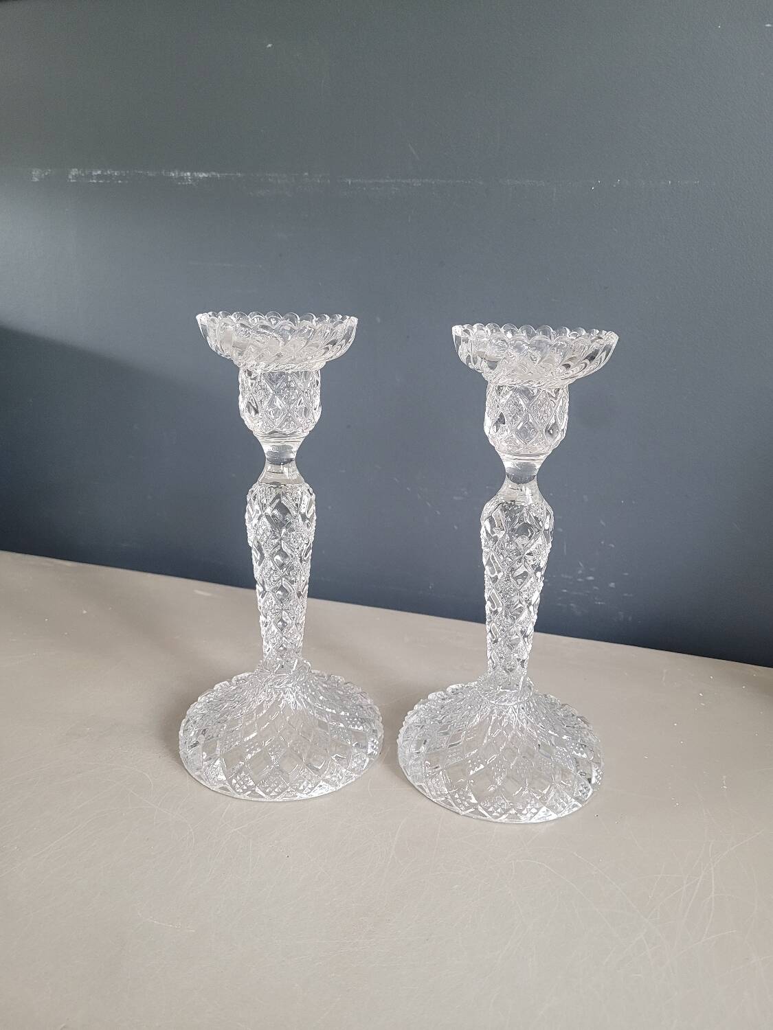 Pair of antique molded glass candlesticks