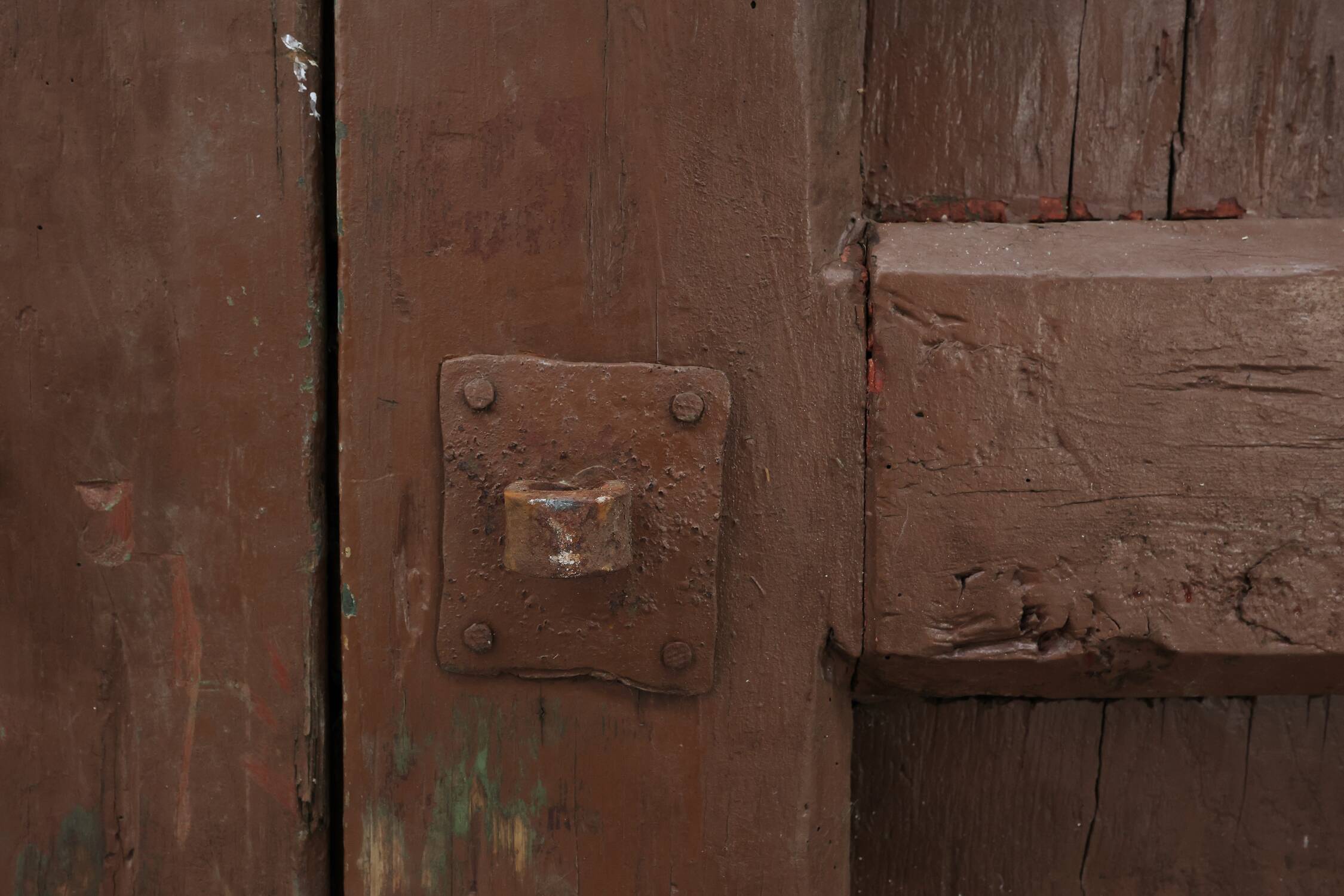 Large 17th century Monastery doors in terracotta lacquered oak, Portugal