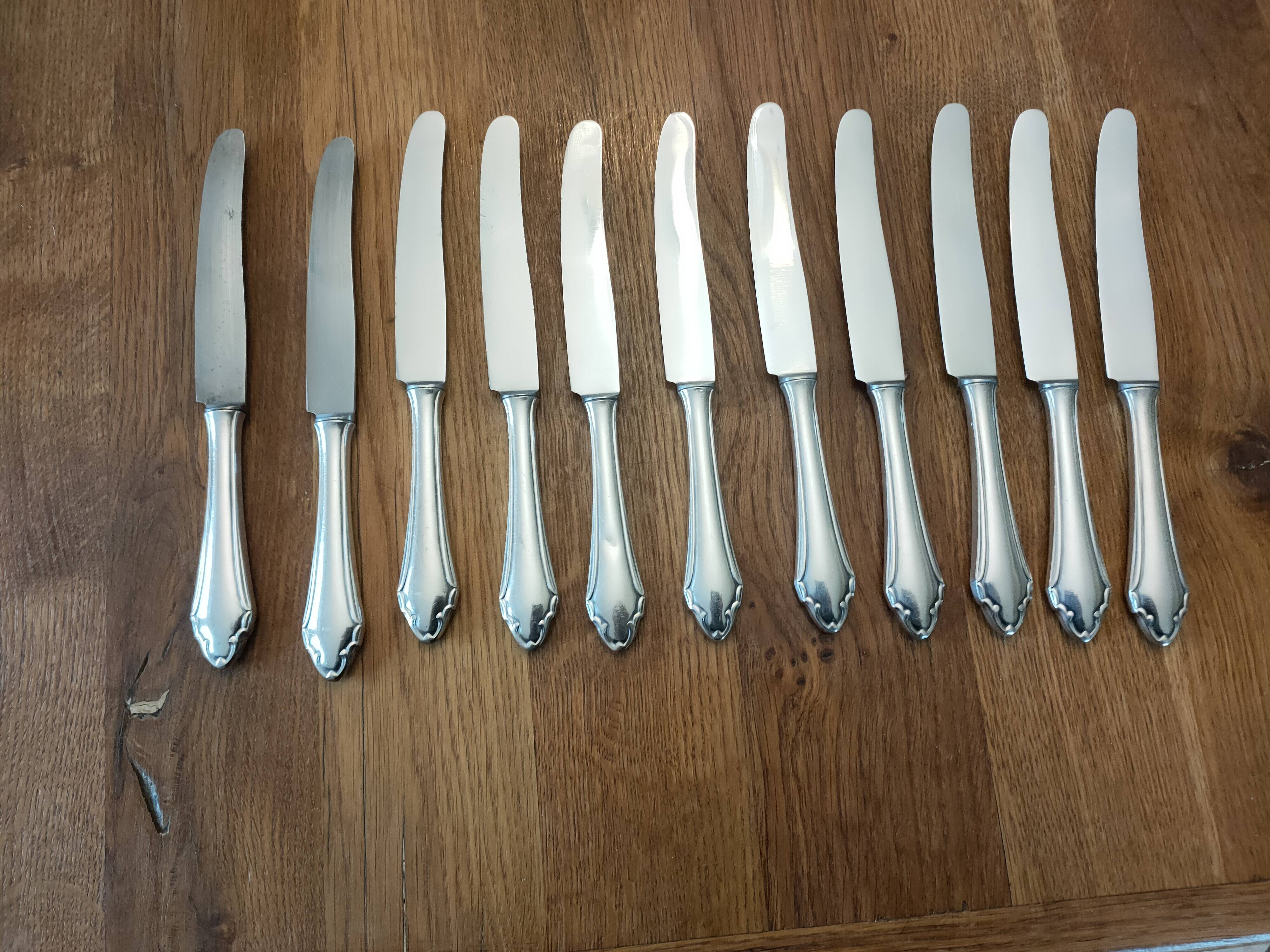 set of 11 silver metal cutlery