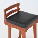Erik Buck set of three bar stools in teak and leather Dyrlund Denmark 1960