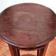 Antique high wooden pedestal with mahogany patina, circa 1900-1925.