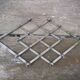 Modernist design foldable trivet in silver metal Jacques Adnet 1940/1950