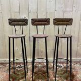 Suite de 3 tabourets de bar en acier et paillés