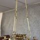 Large Napoleon III period chandelier in bronze and gilt brass