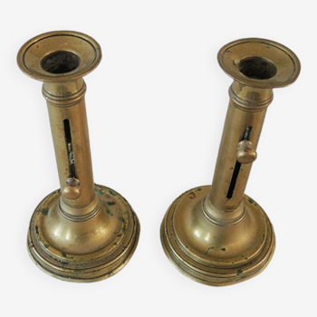 2 old brass pushers