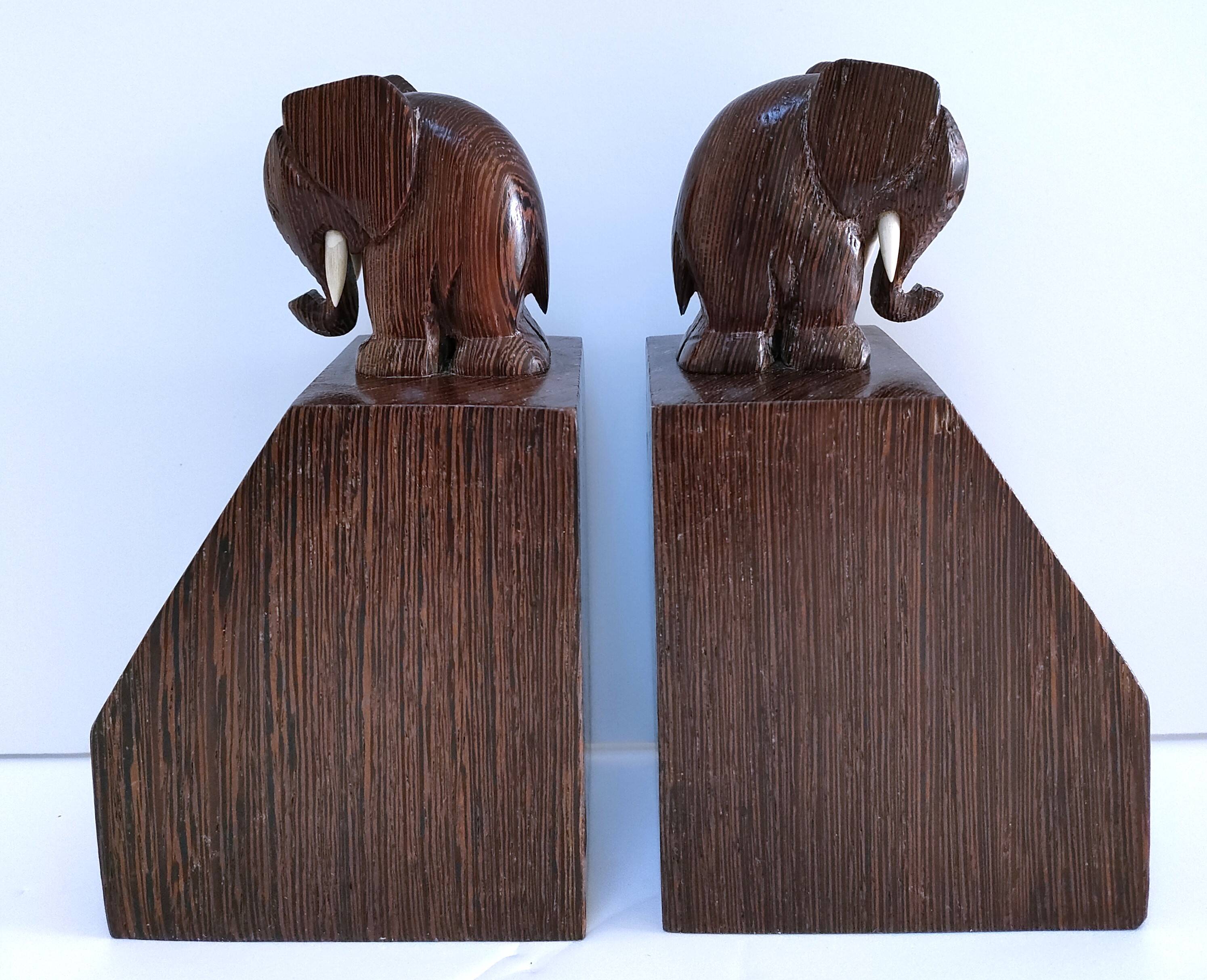 Pair of stylized elephant bookends in solid wood