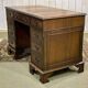 English mahogany pedestal desk with leather top from the 1950s