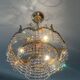 Lustre cascade de pampilles en bronze et cristal