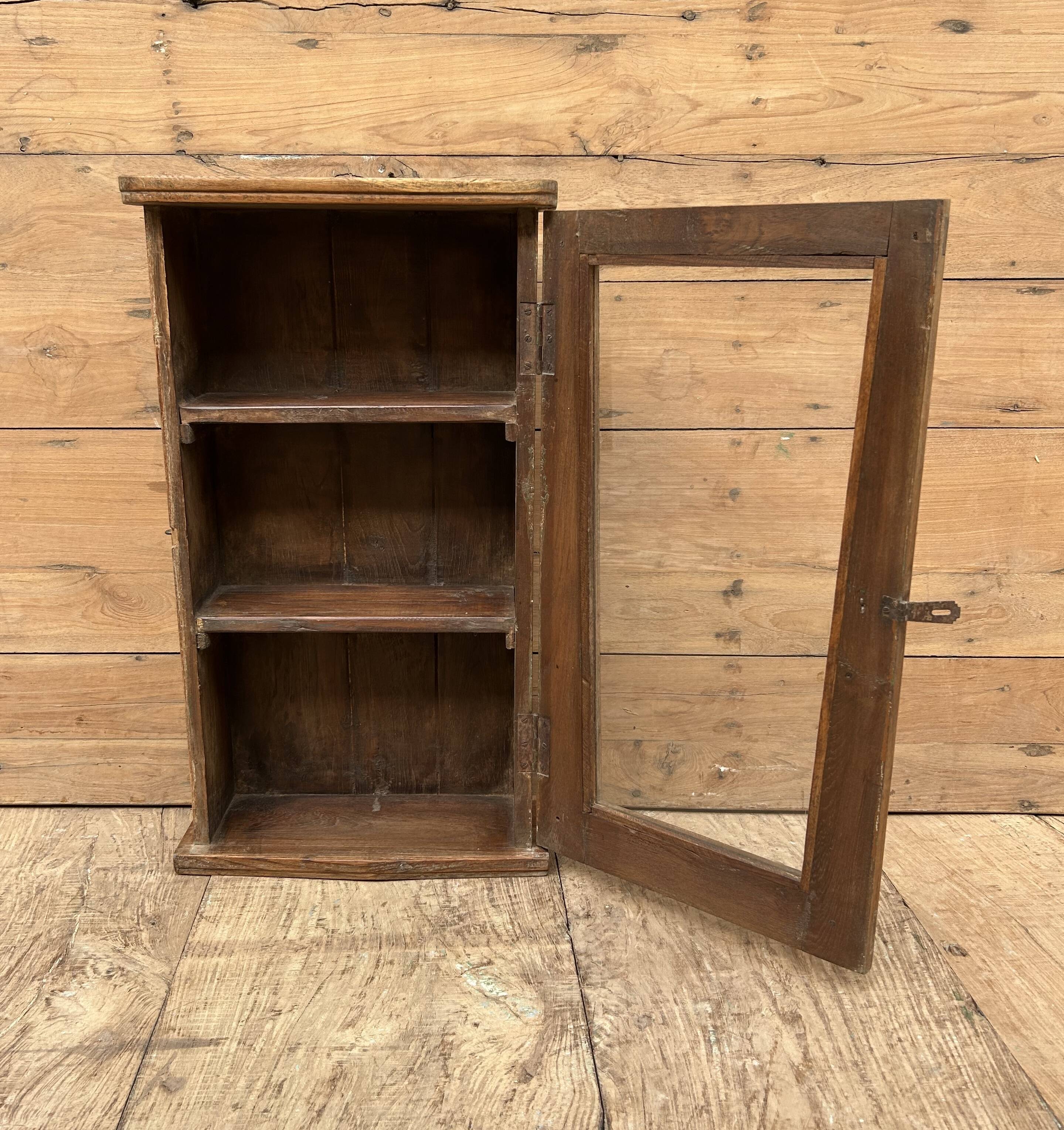 Wall display cabinet in Burmese teak