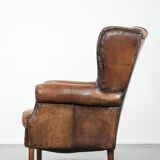 Unique large sheepskin Chesterfield wingback armchair in English style