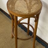 High stool in curved wood and cane seat