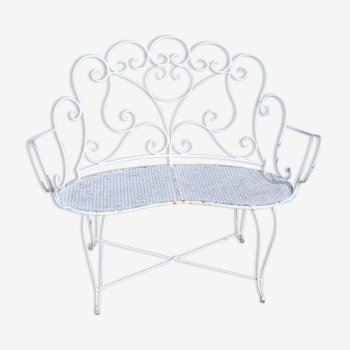 Old rounded garden bench 1920 in wrought iron with scrolls and perforated sheet metal seat 105cm