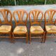 4 country-style Louis Philippe medallion chairs with rush seats from the 1970s.