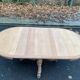 Extendable round farmhouse dining table restored in solid oak from the 19th century