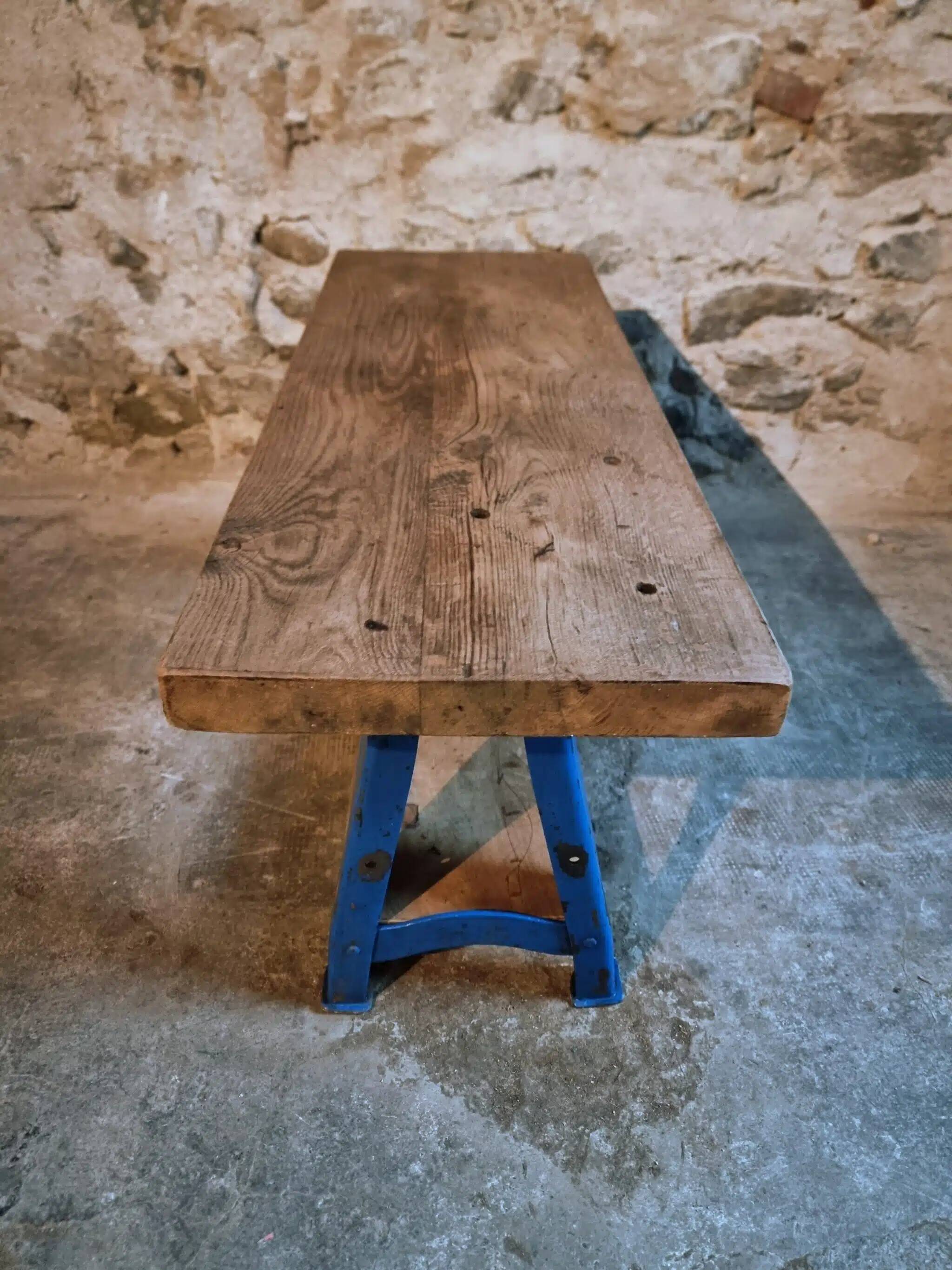 Vintage industrial workbench table with cast iron legs (Aux Forges de Vulcain)