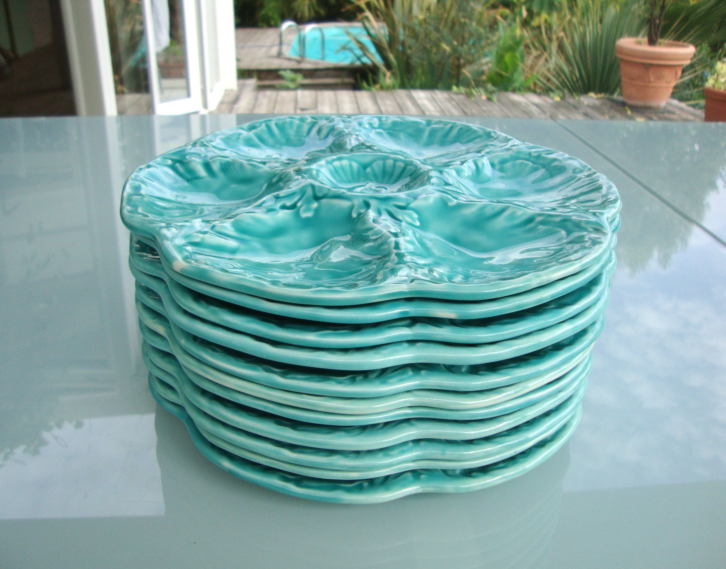 Lot de 11 assiettes à huitres de Gien
