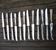 12 anciens couteaux de table Orbrille en inox