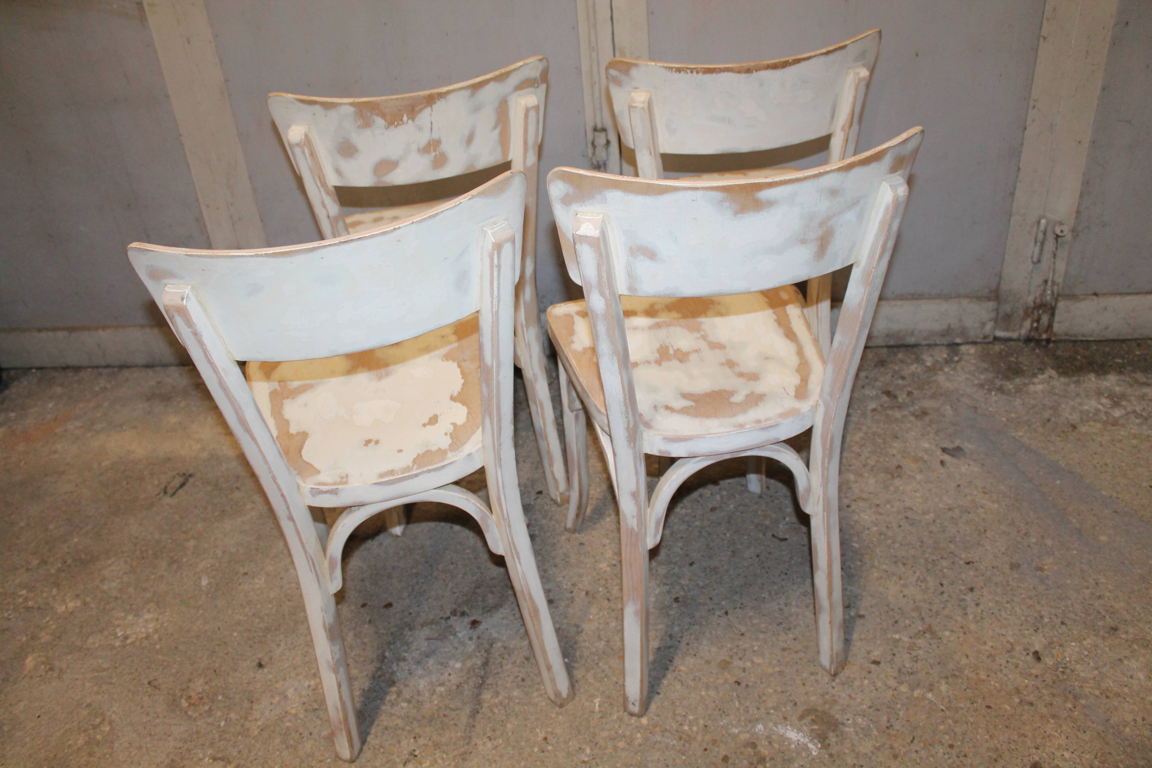 Lot of four bistro chairs