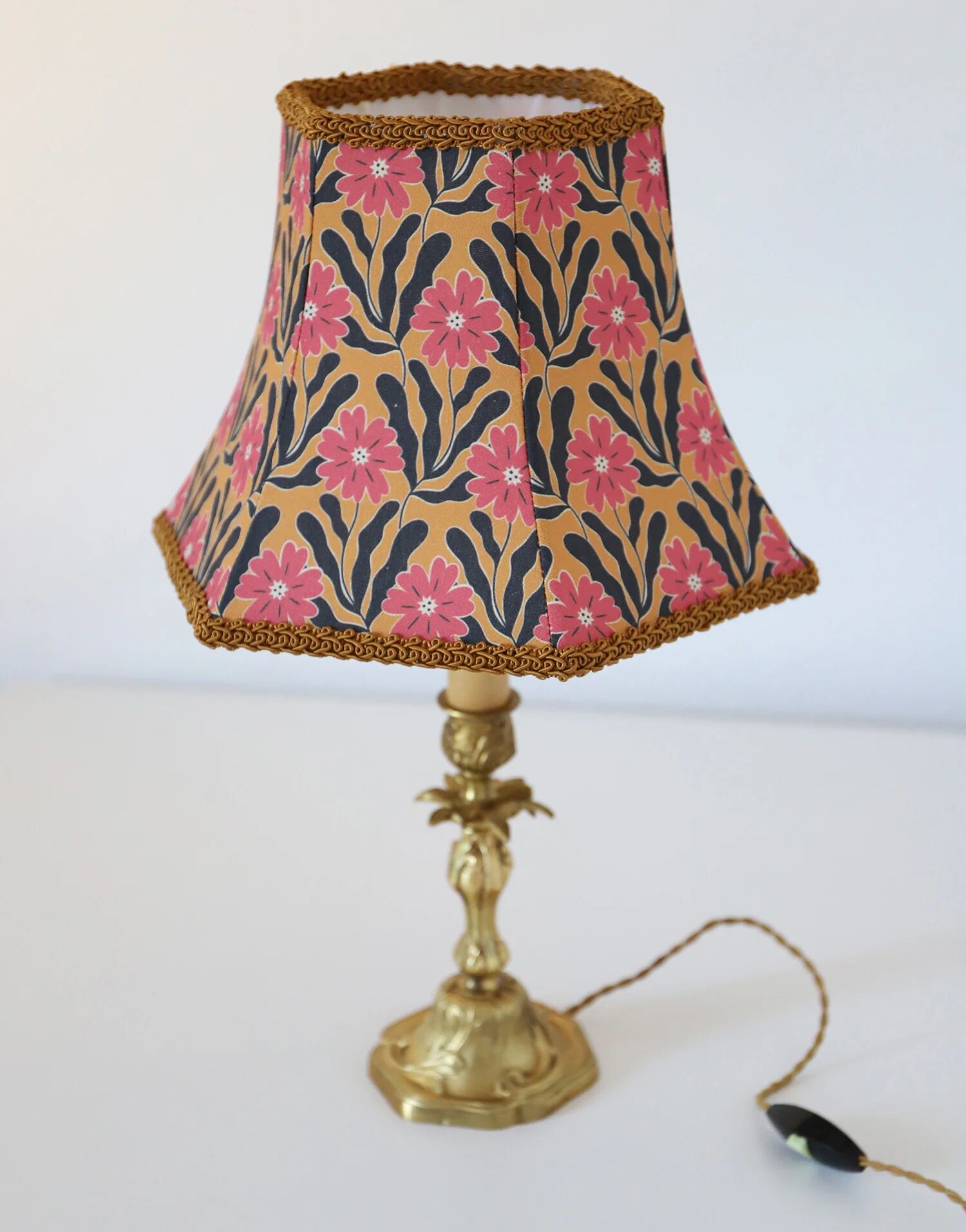 Recycled vintage lamp — antique bronze candlestick base and graphic flowers