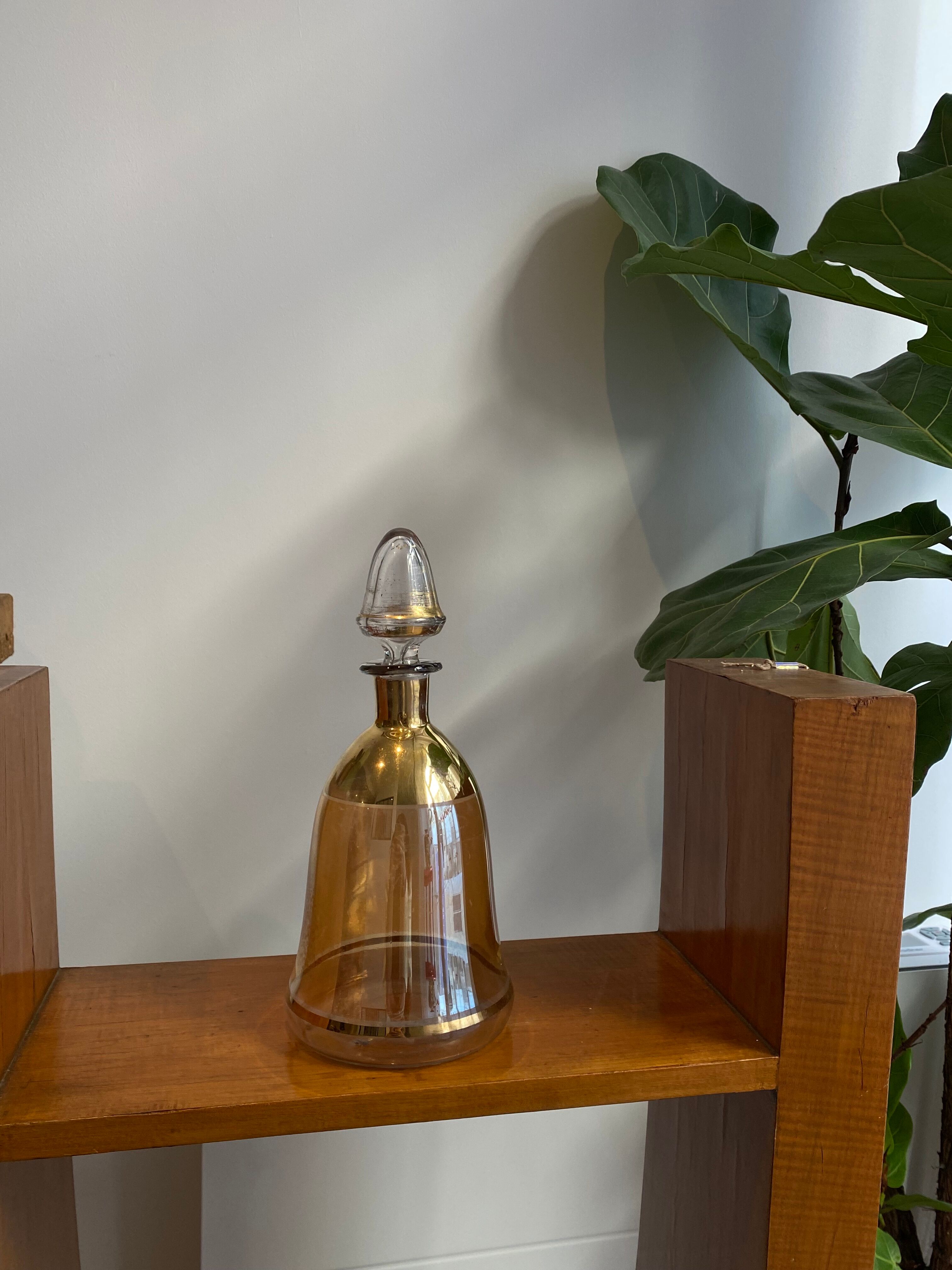 Amber crystal decanter and golden details