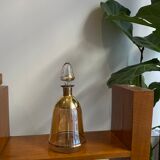 Amber crystal decanter and golden details