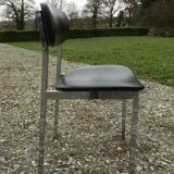 6 vintage chairs in black skaï with chrome metal tubular base.