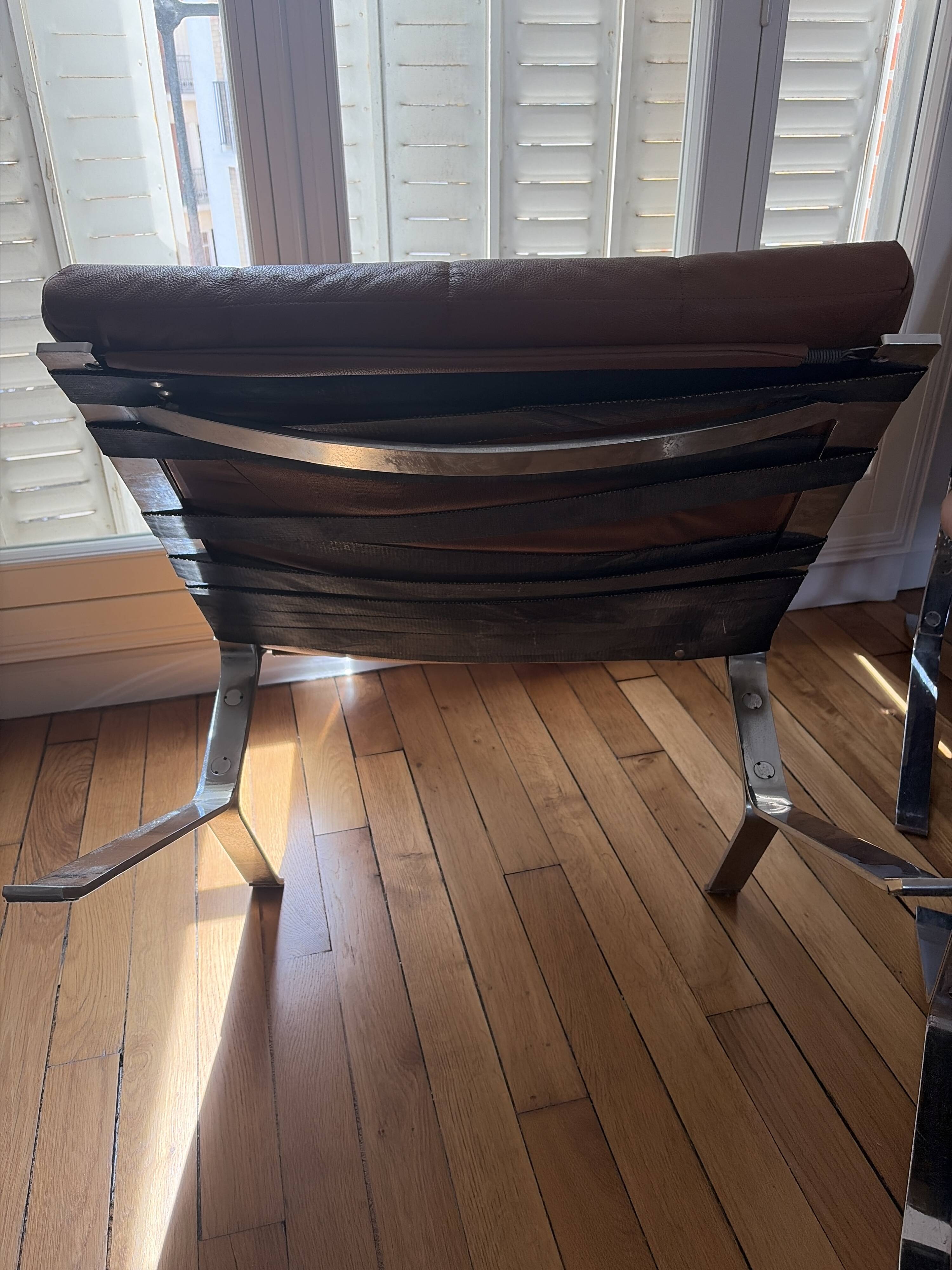 Armchairs and footrests by Olivier Mourgue