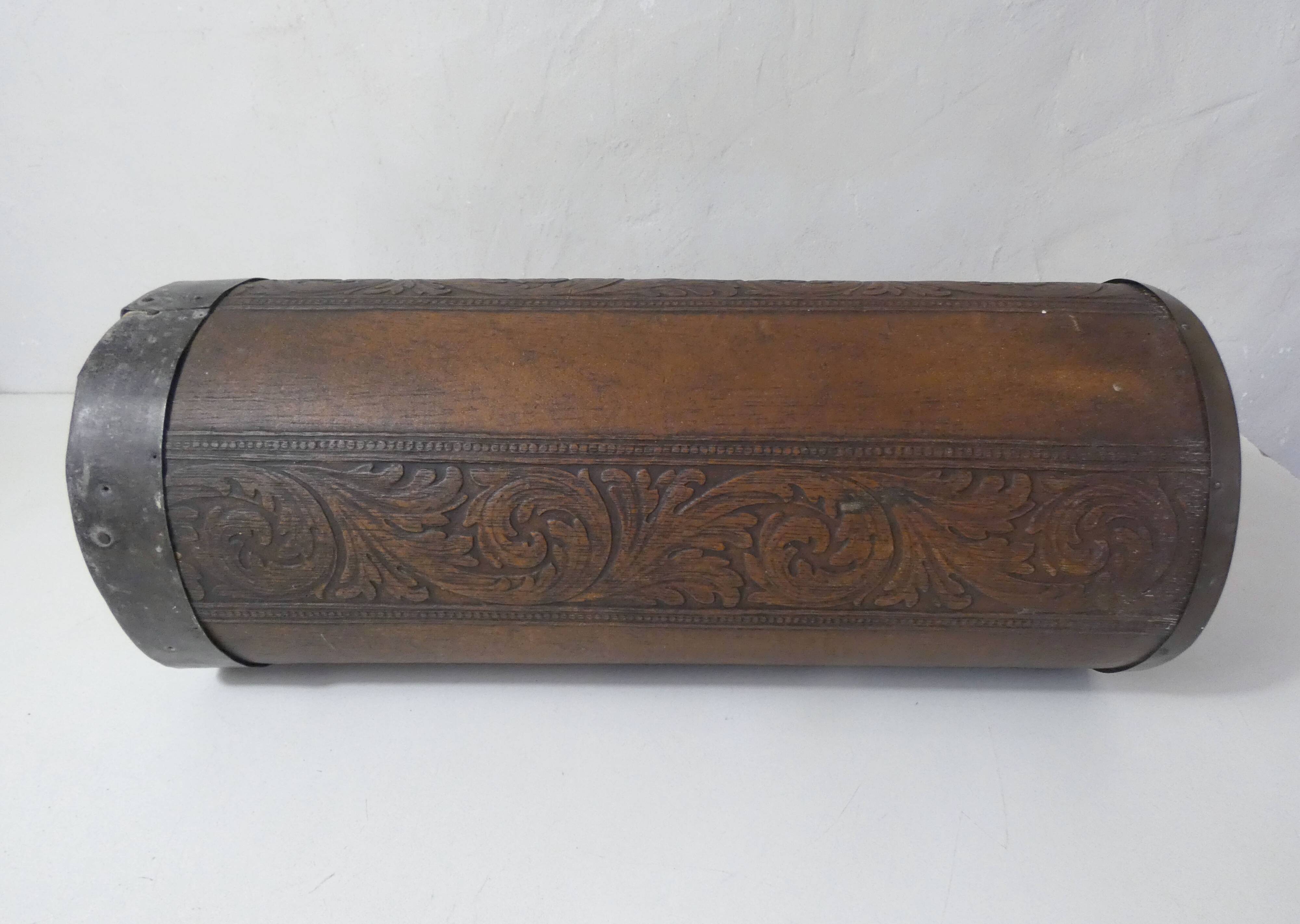 old carved wooden umbrella stand