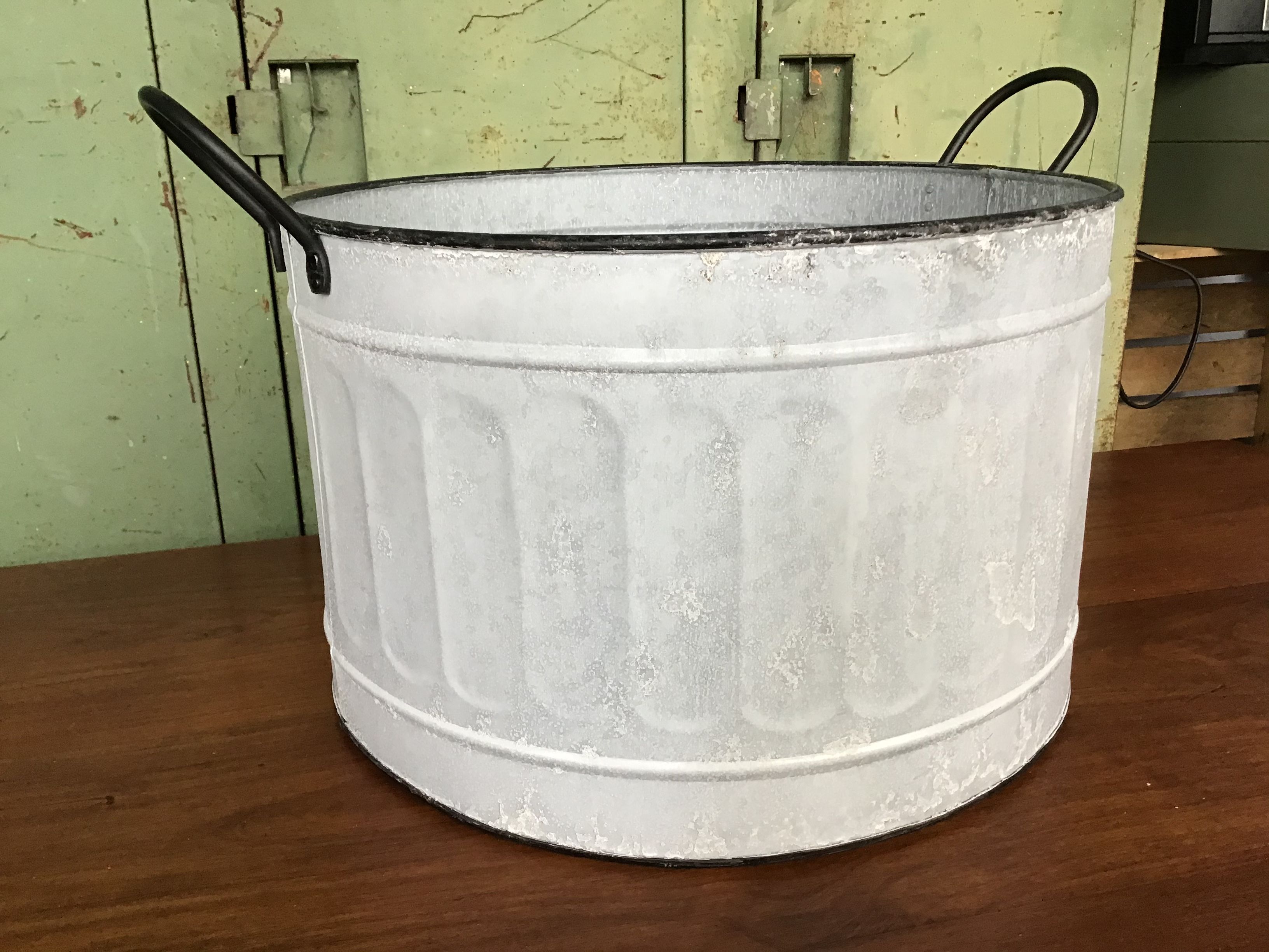 large round basin in vintage zinc