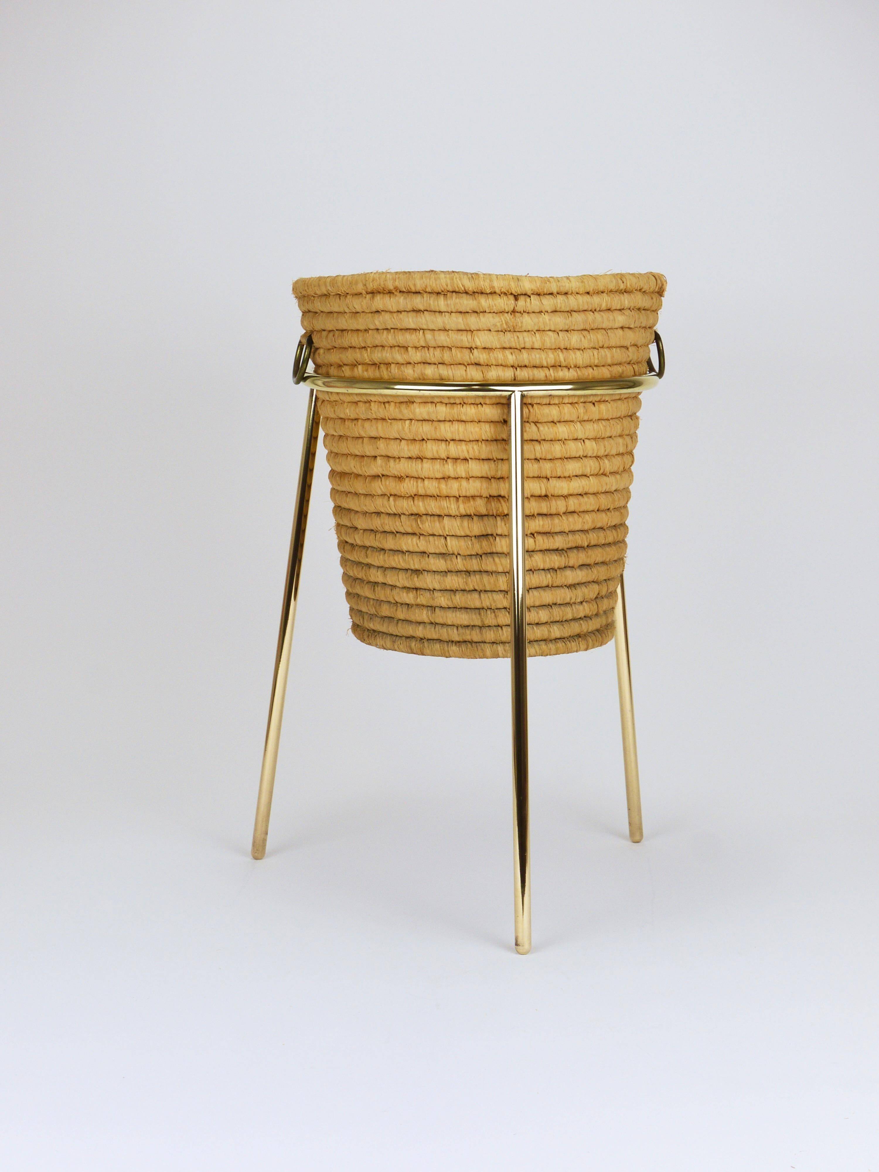 Carl Auböck II paper basket in raffia and brass, umbrella stand, 1950s