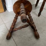 Set of two tripod stools in turned wood