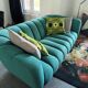 Set of 2 sofas and 2 poufs by Roche Bobois.