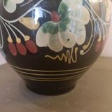 Large glazed terracotta pitcher with floral decoration