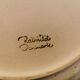Ceramic plates, designed and made by Danish Ravnild (both stamped and signed)