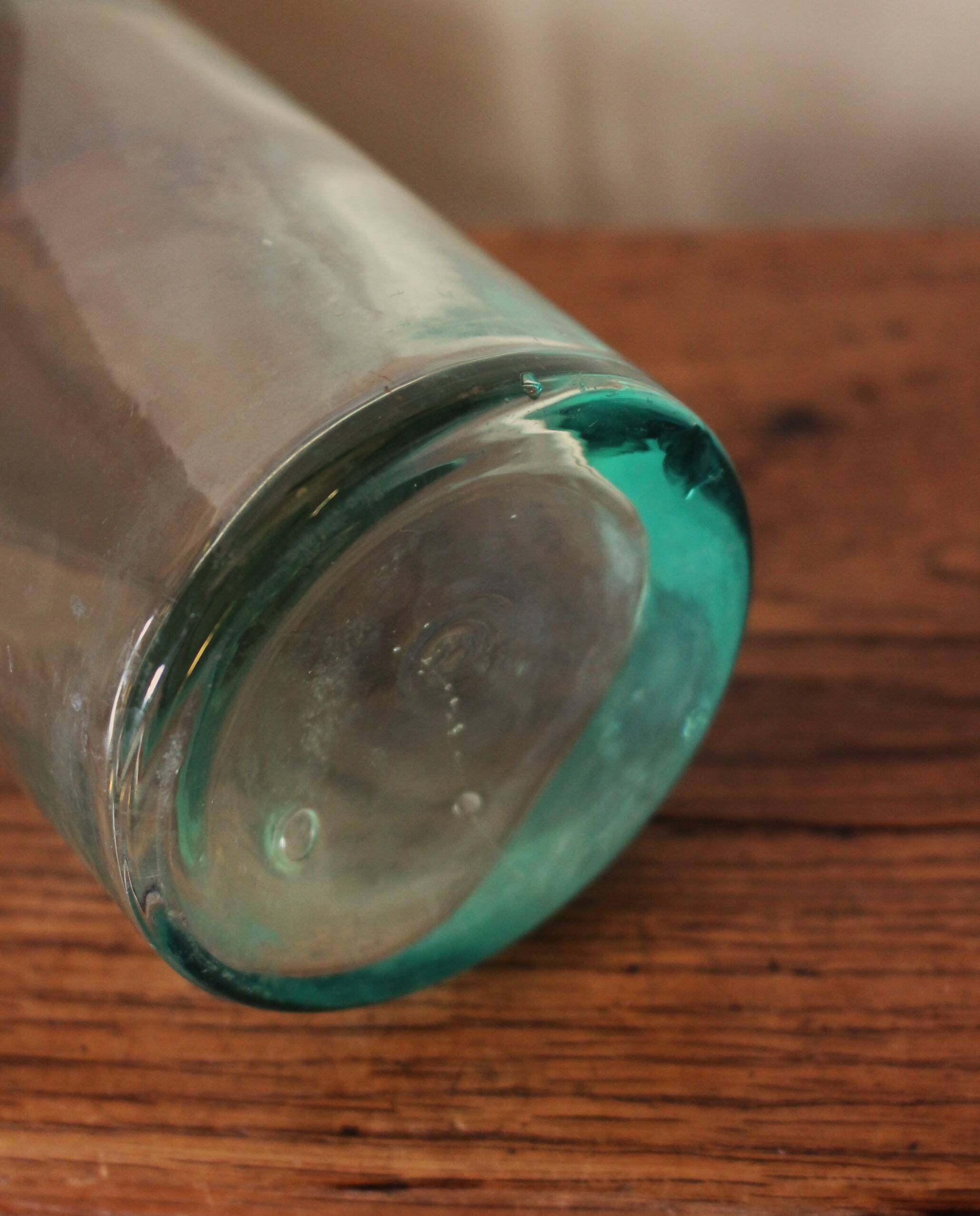 Antique glass milk bottle carafe