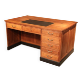 Double administrative desk with cupboard and drawer.