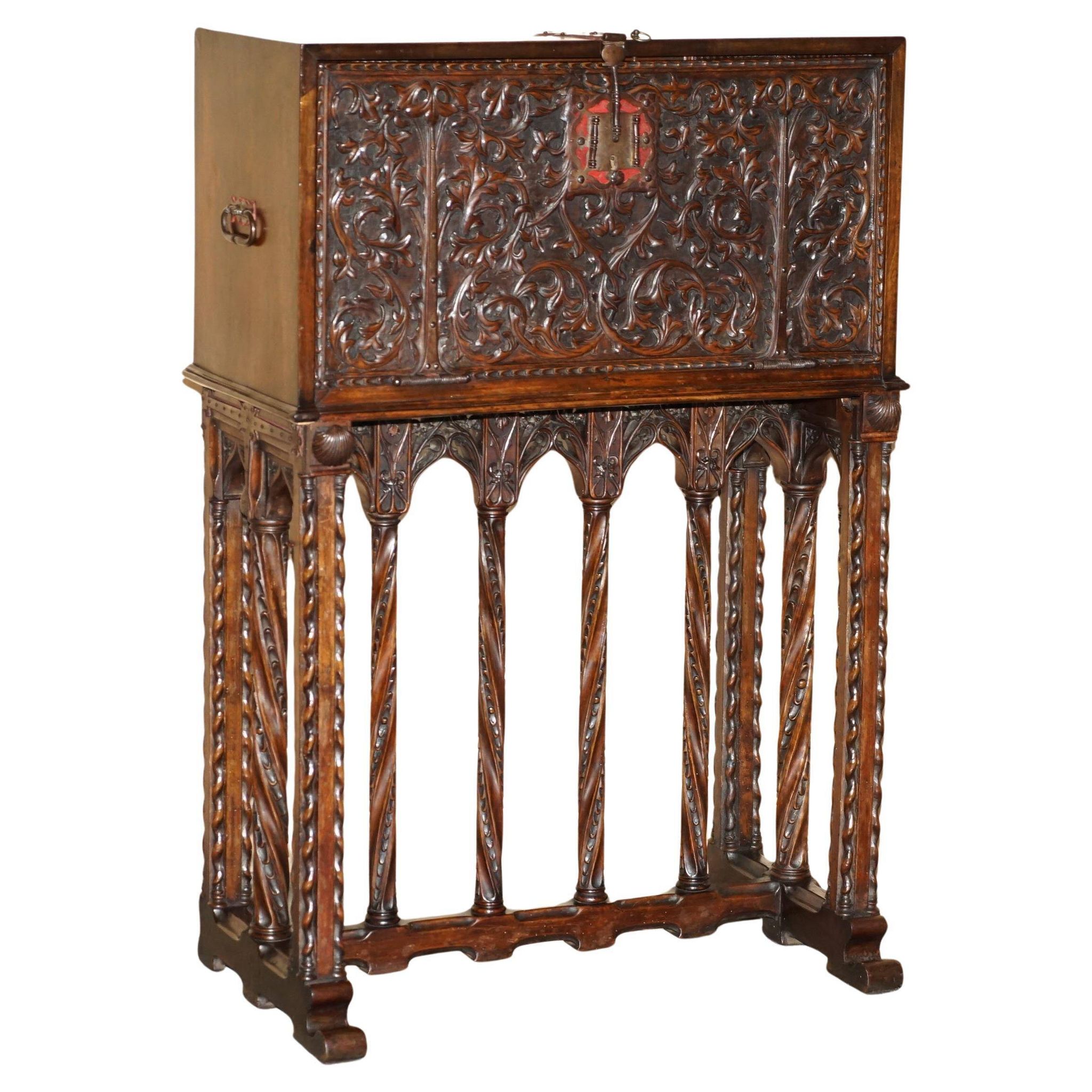 18th-century carved Spanish cabinet with hidden storage.