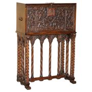 18th-century carved Spanish cabinet with hidden storage.