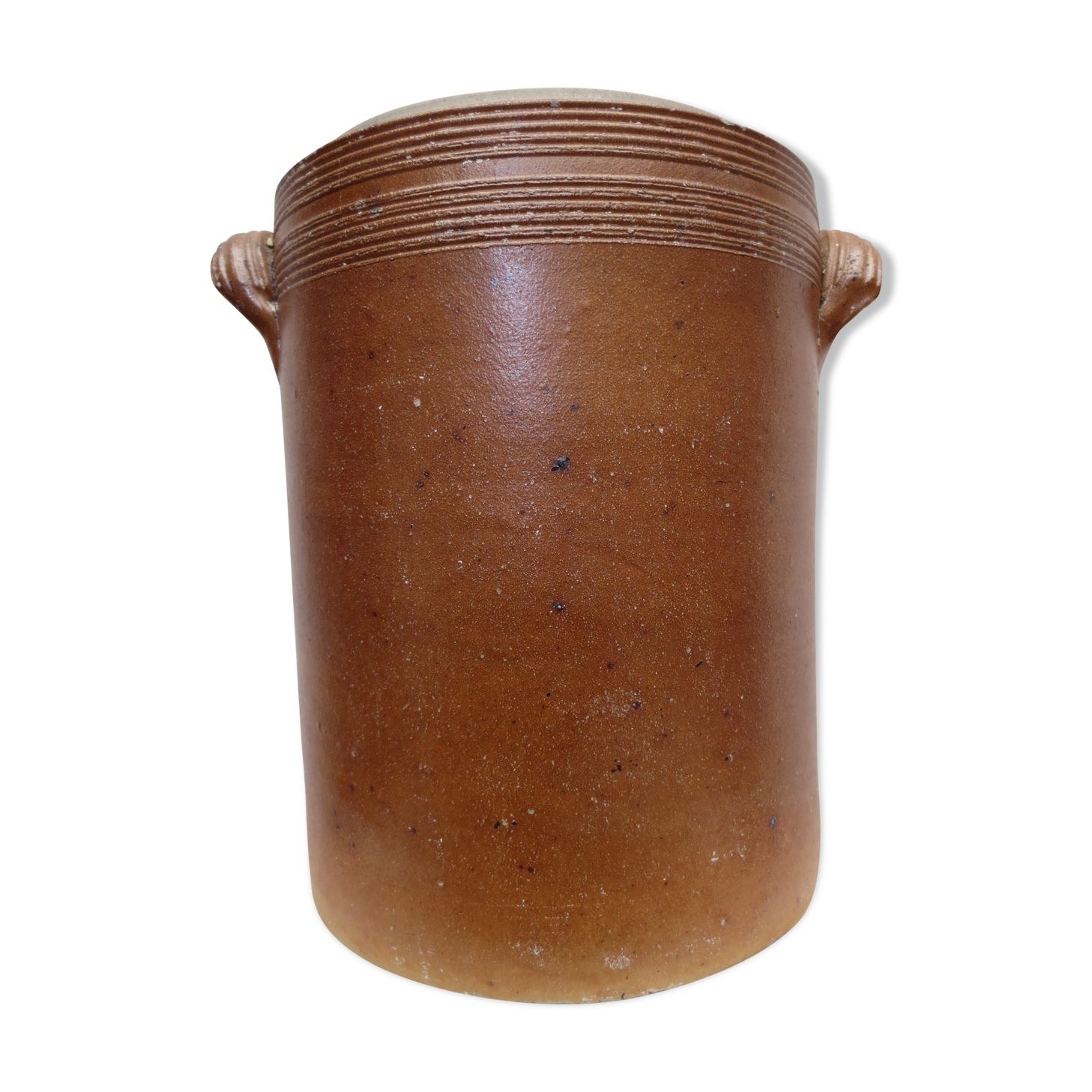 Old butter jug in flaming sandies