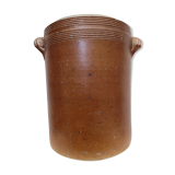 Old butter jug in flaming sandies