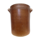 Old butter jug in flaming sandies