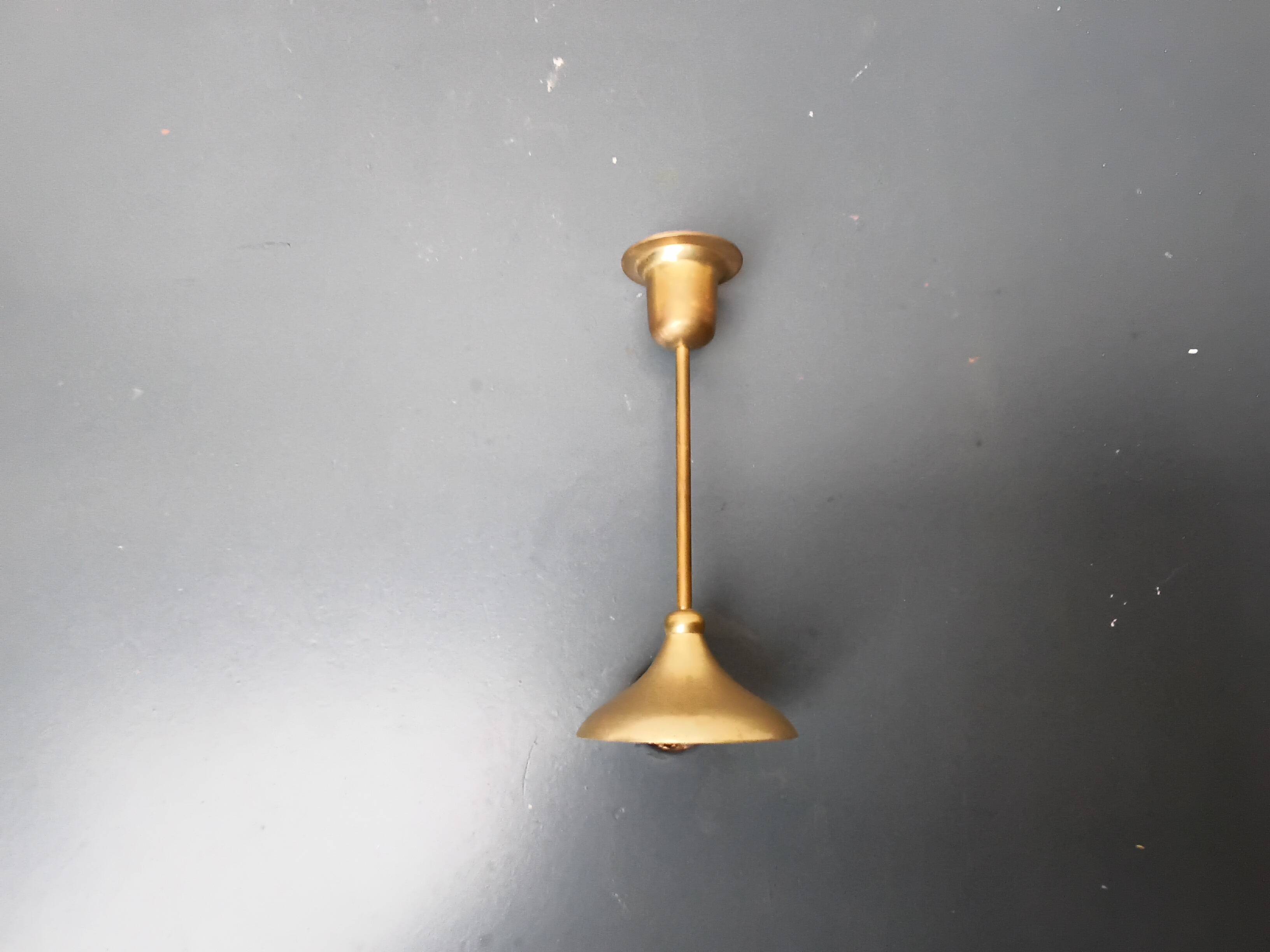 A brass candle holder