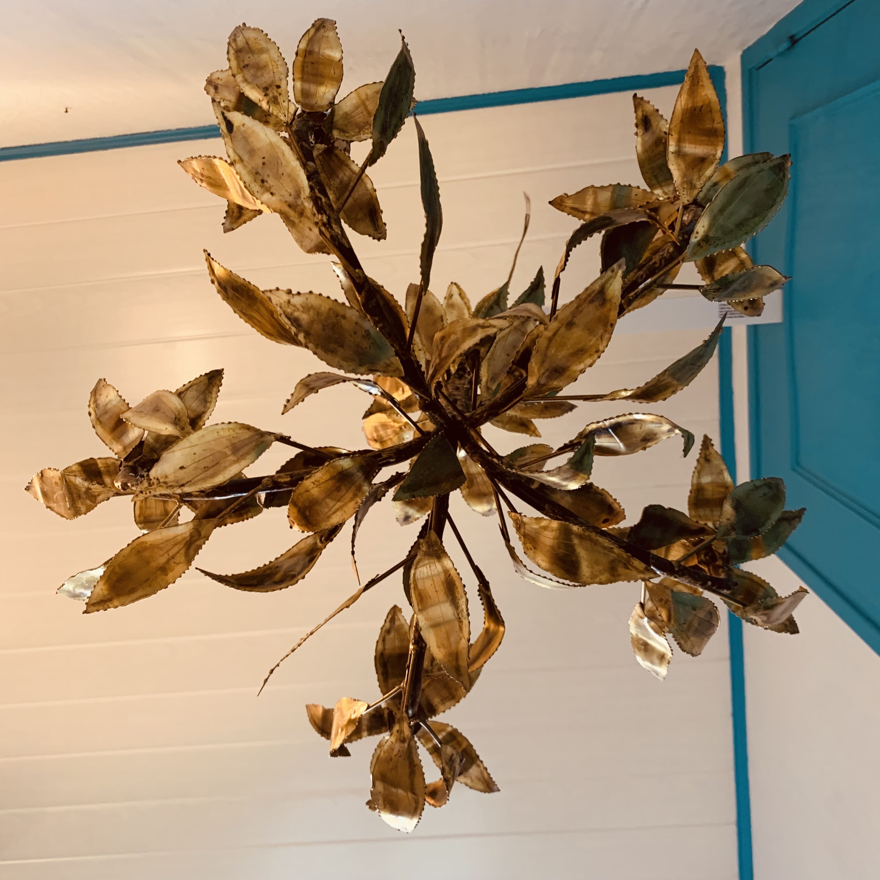 Vintage chandelier foliage decoration